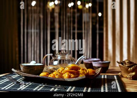 Dim sum and tea set on the table in the restaurant. Stock Photo