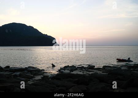 Sunset in Loh Dalum, Phi Phi Island. Stock Photo