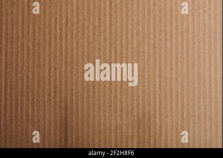 Striped carton paper background. Texture of brown color card Stock Photo
