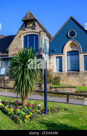 The town sign in Haywards Heath in West Sussex county, England, and Zizzi italian restaurant in the background. Stock Photo