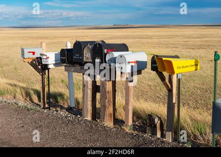 Colorado, USA - July 10, 2014: Mailboxes by a road in a rural area of the State of Colorado, USA. Stock Photo