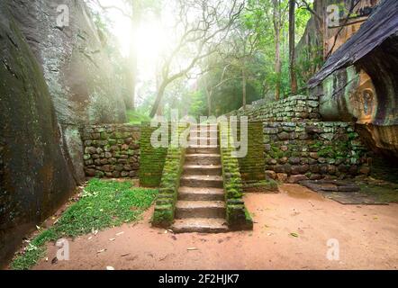 Ancient staircase, covered with moss on the Sigiriya in Sri Lanka Stock Photo