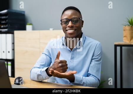 Young African American Man Learning Sign Language Stock Photo