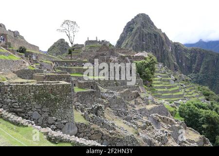 An aerial view of Machu Picchu, an Incan citadel set in the Andes Mountains in Peru Stock Photo