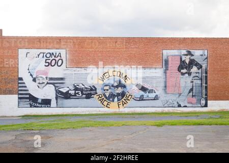 A painted mural for NASCAR legends Dale Earnhardt and Richard Petty on a brick building in Bristol, Viginia, Tennessee near Bristol Motor Speedway. Stock Photo