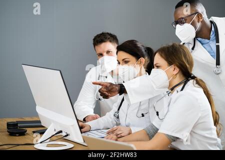Physician Medical Doctor Training Diverse Group In Face Mask Stock Photo