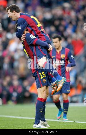marc-bartra-and-leo-messi-of-