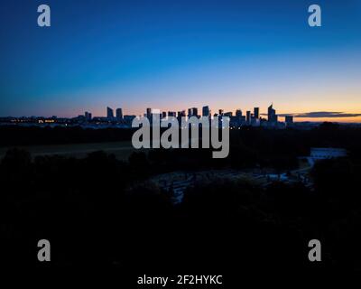 Aerial la défense from Bagatelle, with Silhouette of La Défense Skyline in Background Early Morning Stock Photo
