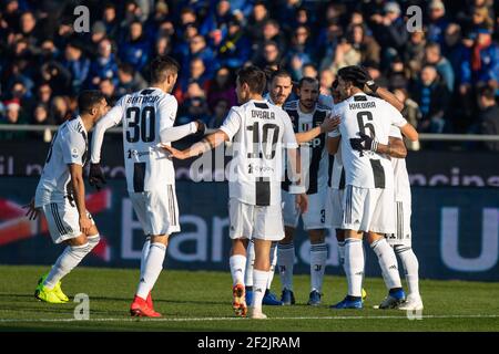 Juventus players celebrate the Atalanta's Berat Djimsiti own goal during the Italian championship Serie A football match between Atalanta and Juventus on December 26, 2018 at Atleti Azzurri d'Italia stadium in Bergamo, Italy - Photo Morgese - Rossini / DPPI Stock Photo