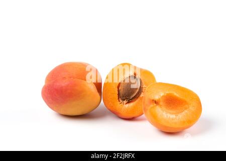 Two yellow peaches isolated on white background Stock Photo