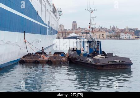 Marine vessel pumping out sewage from a ferry boat, Liguria, Italy, Europe Stock Photo