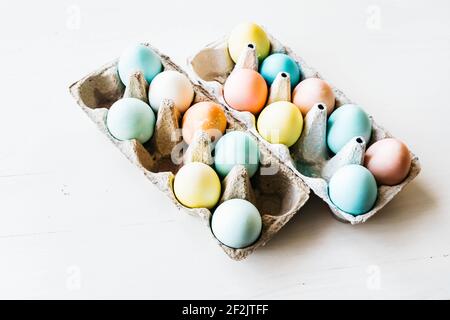 Cartons of dyed eggs ready for Easter Stock Photo