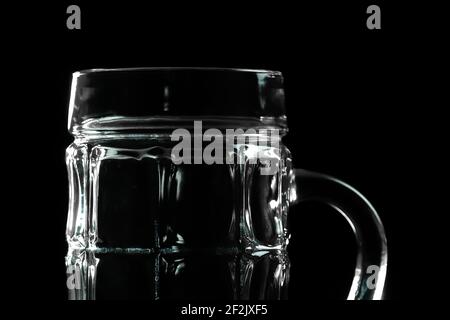 Close-up of an empty beer mug on a black background Stock Photo