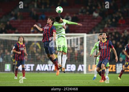 Sergi Roberto of FC Barcelona duels for the ball with Juan Rodriguez of Getafe CF during the Spanish Cup 2013/2014 Copa del Rey between FC Barcelona and Getafe on January 8, 2014 in Barcelona, Spain. Photo Manuel Blondeau / AOP PRESS / DPPI Stock Photo