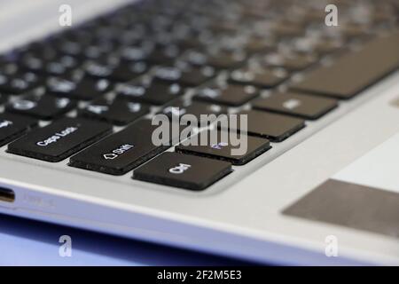 Side View Of White Laptop Key Pad. Selective Focus Stock Photo