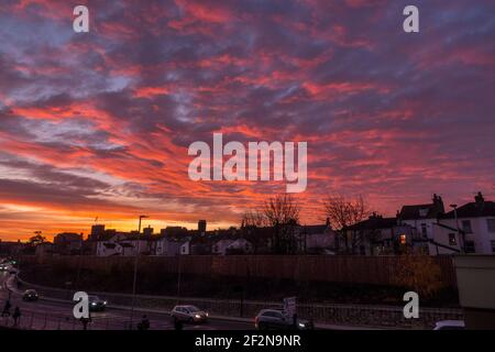 Sunrise illuminating the clouds over Gravesend Kent Stock Photo