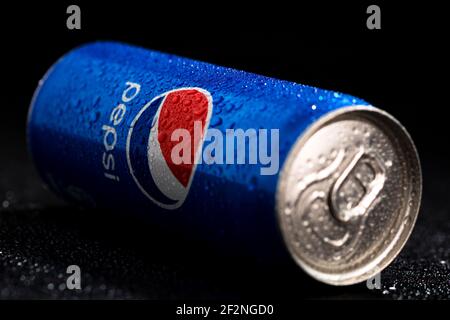 Editorial photo of Pepsi can with water droplets on black background. Studio shot in Bucharest, Romania, 2021 Stock Photo