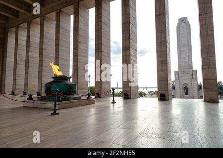 Eternal flame in the Triumphal Propylaea of the Homeland and main tower. National Flag Memorial located at Rosario city, Argentina. Stock Photo