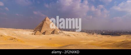 Panorama, Egypt, Cairo, pyramids of Giza, distant view with the haze of the Nile valley Stock Photo