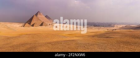 Panorama, Egypt, Cairo, pyramids of Giza, distant view with the haze of the Nile valley Stock Photo