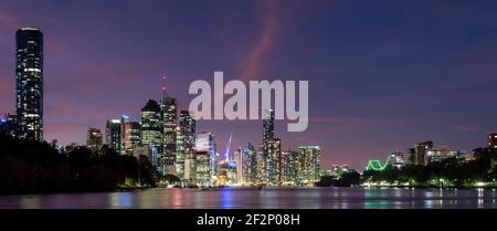 Looking down the Brisbane River after sunset towards the city lights of Brisbane. Stock Photo