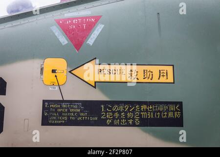 Close up of the cockpit rescue warning signs on the side of a Mitsubishi F1 jet fighter of the Japanese Air Self-Defence Force, in Nara city, Japan Stock Photo