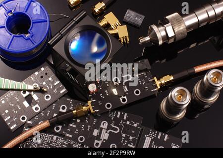 Microwave amplifier printed circuit board board and tools for measurement. Research and development of RF product Stock Photo