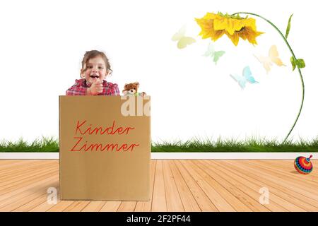 Child in a cardboard box Stock Photo