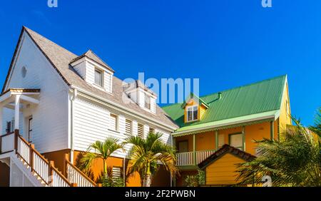 Colorful houses in the Orient Bay district on the island of Saint Martin in the Caribbean Stock Photo