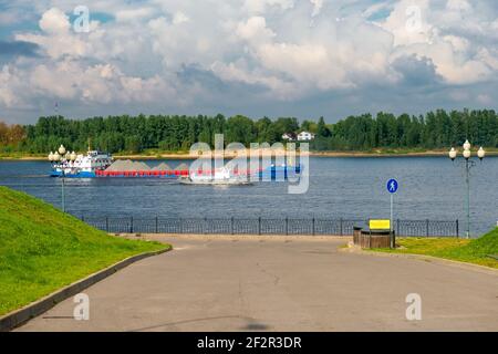 Ship and cargo barge on the Volga river in the city of Rybinsk Stock Photo