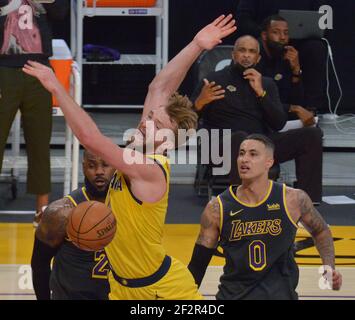 Los Angeles, United States. 12th Mar, 2021. Los Angeles Lakers' forward LeBron James fouls Indiana Pacers' forward Domantas Sabonis during the fourth quarter at Staples Center in Los Angeles on Friday, March 12, 2021. The Lakers defeated the Pacers 105-100. Photo by Jim Ruymen/UPI Credit: UPI/Alamy Live News Stock Photo