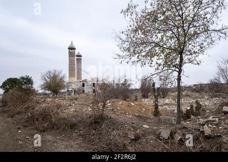 AGDAM, AZERBAIJAN - DECEMBER 14: View of the19th century Juma Mosque the only building left standing in the town of Agdam which was destroyed by Armenian forces during the First Nagorno-Karabakh War on December 14, 2020 in Agdam, Azerbaijan. The town and its surrounding district were returned to Azerbaijani control as part of an agreement that ended the 2020 Nagorno-Karabakh War. Stock Photo