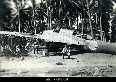 WW2 WWII US soldiers near a Japanese Aircraft Wrecks World War Two Japan - Kawasaki Ki-48 'Lily' Light Bomber Stock Photo