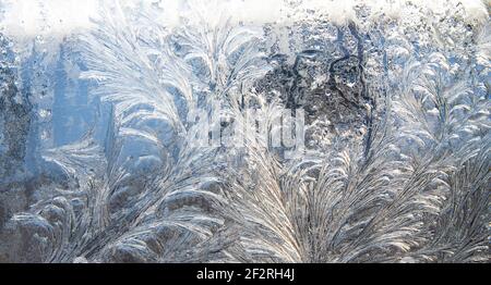 frost pattern on a window glass in the winter (as an abstract winter background) Stock Photo