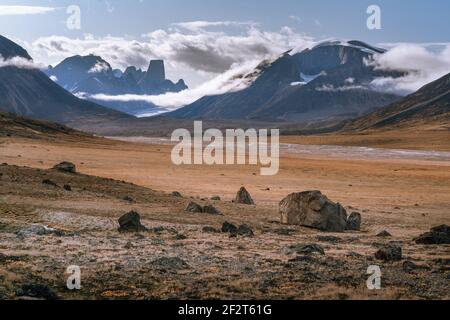 Owl River bed near Mt. Asgard, in arctic remote valley, Akshayuk Pass, Nunavut. Beautiful arctic landscape in the late, sunny afternoon. Iconic Stock Photo