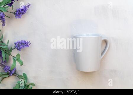 White mug mockup on gray watercolor background flat lay copy space Stock Photo