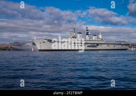 The Invincible class light aircraft carrier HMS Ark Royal anchored in the Firth of Clyde with the French assault carrier FS Tonnerre in 2008. Stock Photo