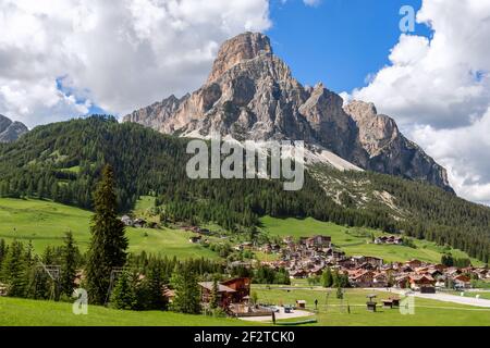 Beautiful view of the Sassongher mountain and an alpine village Corvara at the foot of the mountain Stock Photo