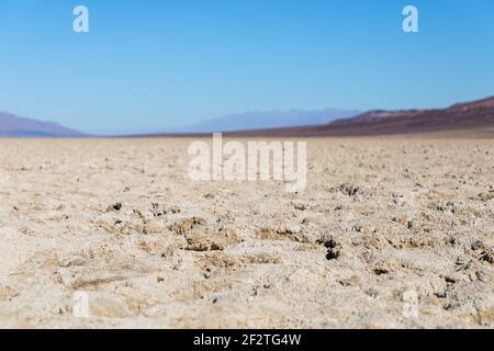 View of the Basins salt flats, Badwater Basin, Death Valley, Inyo County, salt Badwater formations in Death Valley National Park. California, USA (Sel Stock Photo