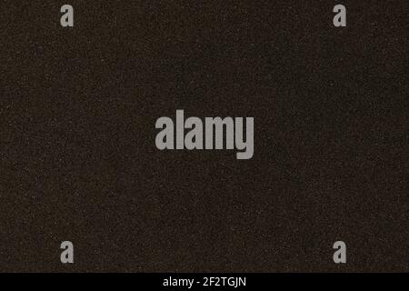 Black texture with micro-relief and glitter. Black glitter texture Stock Photo