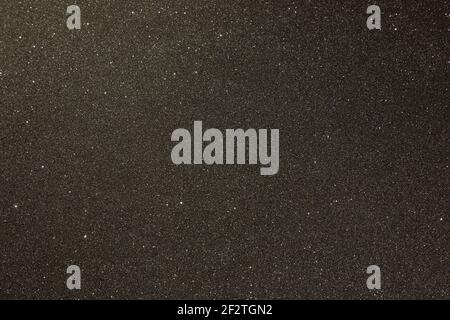 Black texture with micro-relief and glitter. Black glitter texture Stock Photo