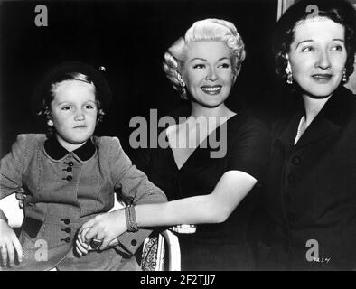LANA TURNER with her Daughter CHERYL CHRISTINE CRANE and her Mother MILDRED FRANCES COWAN 1950 on set candid during filming of MR IMPERIUM aka YOU BELONG TO MY HEART (released 1951) director DON HARTMAN Metro Goldwyn Mayer Stock Photo