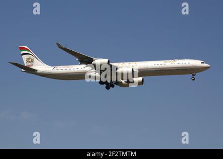 Etihad Airways Airbus A340-600 with registration A6-EHK on final for runway 07R of Frankfurt Airport. Stock Photo