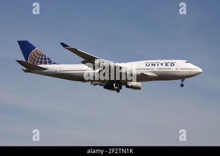 United Airlines Boeing 747-400 with registration N117UA on final for runway 07R of Frankfurt Airport. Stock Photo