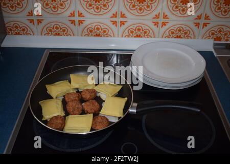 Maultaschen and meat balls Stock Photo