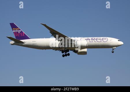 Thai Cargo Boeing 777F with registration N775SA on short final for runway 07R of Frankfurt Airport. Stock Photo