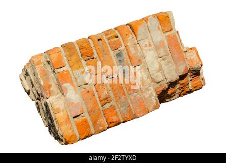 Broken brick pillar falling. Piece of brick column on isolated white background for your design Stock Photo