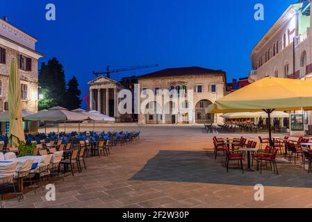 Sunrise view of the Temple of Augustus and government office in Croatian town Pula Stock Photo