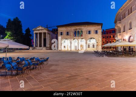 Sunrise view of the Temple of Augustus and government office in Croatian town Pula Stock Photo