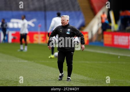 Selhurst Park, London, UK. 13th Mar, 2021. English Premier League Football, Crystal Palace versus West Bromwich Albion; West Bromwich Albion Assistant Coach Sammy Lee observing the West Bromwich Albion players warming up Credit: Action Plus Sports/Alamy Live News Credit: Action Plus Sports Images/Alamy Live News